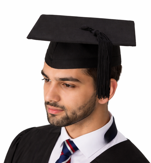 Graduate wearing a black cap and gown with a striped tie on a white background